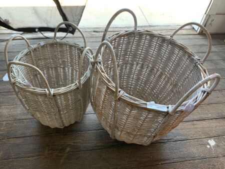 Pair of white cane baskets