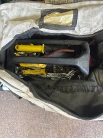 Tool bag containing C-clamps and miscellaneous tools