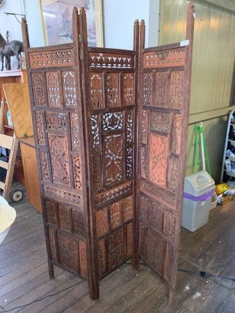Large carved wooden screen