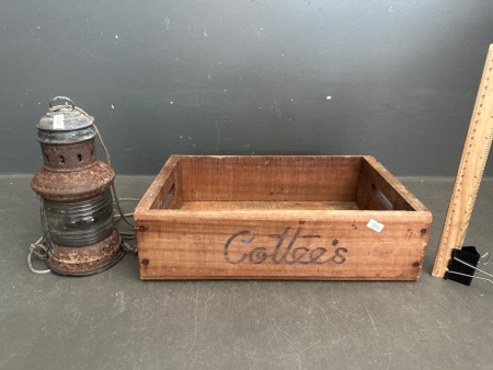 Vintage Wooden Cottees Crate with Antique Signal Lamp