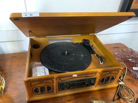 Reproduction record player and radio