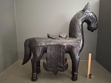 One metre tall Indian Horse sculpture - carved from one solid piece of timber with black lacquerware patina - can be used as a seat.