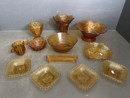 large lot of amber glass decor