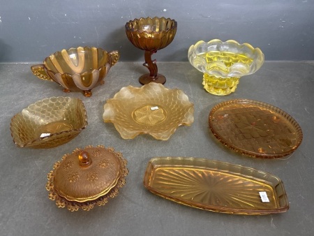 large lot of amber glass decor
