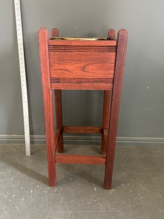 wooden plant stand with decorative plant pot