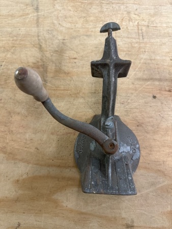 Vintage hand-cranked food grinder