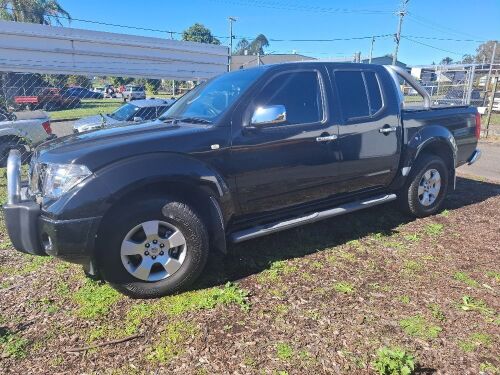 Black Nissan Navara SL-X - 6 Speed Manual V6 Petrol 4L - 4WD - 2006 Model - Dual Cab Truck - Odometer Indicating 192911 - VIN VSKCLND40A0126252 - Nudge Bar - Tow Ball - Chrome Roll Bar - Side Steps - Working A/C - Alpine Stereo - Sub Woofer - Tonneau Cove