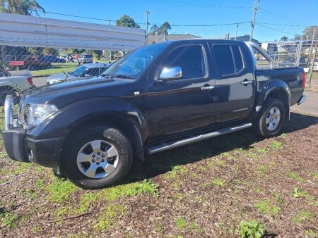 Black Nissan Navara SL-X - 6 Speed Manual V6 Petrol 4L - 4WD - 2006 Model - Dual Cab Truck - Odometer Indicating 192911 - VIN VSKCLND40A0126252 - Nudge Bar - Tow Ball - Chrome Roll Bar - Side Steps - Working A/C - Alpine Stereo - Sub Woofer - Tonneau Cove