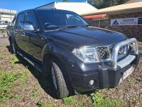 Black Nissan Navara SL-X - 6 Speed Manual V6 Petrol 4L - 4WD - 2006 Model - Dual Cab Truck - Odometer Indicating 192911 - VIN VSKCLND40A0126252 - Nudge Bar - Tow Ball - Chrome Roll Bar - Side Steps - Working A/C - Alpine Stereo - Sub Woofer - Tonneau Cove - 3
