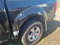 Black Nissan Navara SL-X - 6 Speed Manual V6 Petrol 4L - 4WD - 2006 Model - Dual Cab Truck - Odometer Indicating 192911 - VIN VSKCLND40A0126252 - Nudge Bar - Tow Ball - Chrome Roll Bar - Side Steps - Working A/C - Alpine Stereo - Sub Woofer - Tonneau Cove - 35