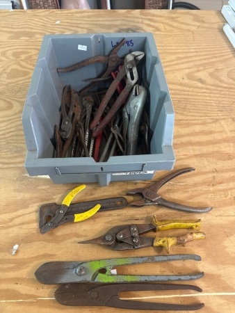 Assorted pliers, tin snips and wrenches