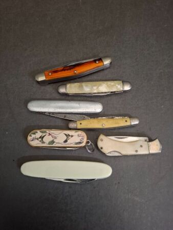 7 Assorted Pocket Knives