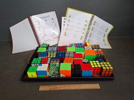 Large Quantity of Rubix Cubes with cheat sheets & timer