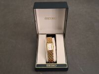 Seiko Stainless Steel Gold Look with Pink Face Ladies Watch - 1N00-F190 - In Original Box