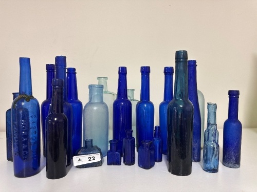 Assortment of Blue Glass Bottles