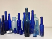 Assortment of Blue Glass Bottles - 3