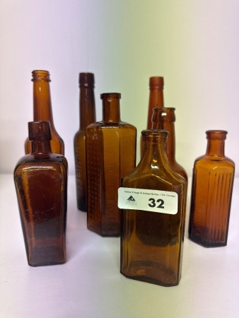 Assortment of Vintage Amber Glass Bottles