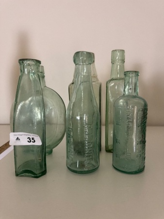 Selection of Green Glass Bottles inc. R.J Jordan Casino & Harveys Essence