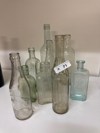 Assortment of Vintage Clear Bottles