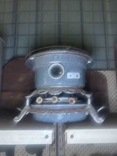 Enamelled kerosene sad iron heater