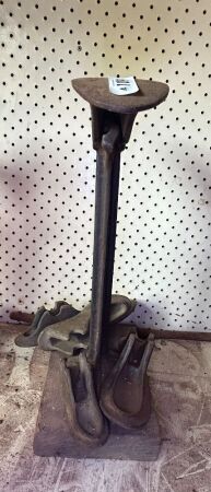 Cast iron cobblers shoe stand with various size lasts
