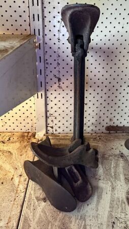 Cast iron cobblers shoe stand with various size lasts