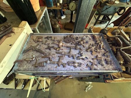 Shelf lot of assorted brass taps