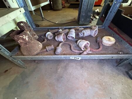 Shelf lot of insulators and brackets