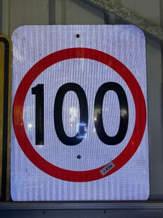 Plastic 100 KPH sign