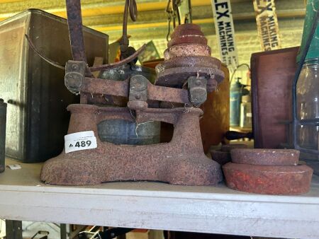 Set of cast iron balance scales and weights