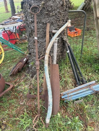 Assortment of tools inc. mattock, hay knife, and ?