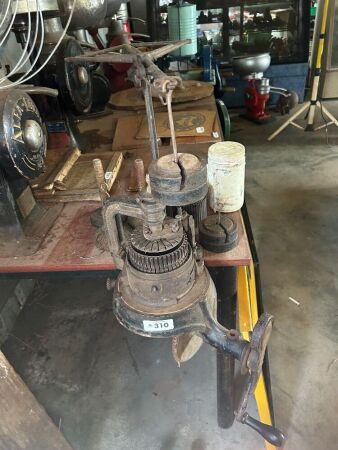Antique hand-cranked sock maker