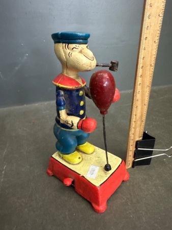 Original Popeye the Sailor Man Cast Iron Bag Puncher
