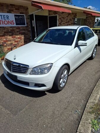 White 2009 Mercedes Benz C220 CDI Auto Sedan - 10% BP - Odometer 122572kms - 2.2L Turbocharged Diesel - 5-speed Automatic - Rear-Wheel Drive - Leather Upholstery - VIN 6U9VSS00000161034 - Engine Number 64681130329470 - Clean PPSR