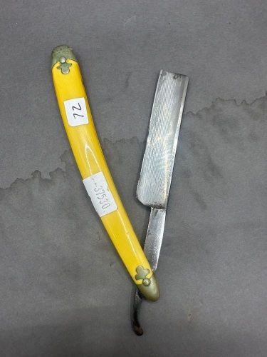 Novelty Cutlery Co cut throat yellow handle razor made in USA