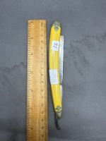 Novelty Cutlery Co cut throat yellow handle razor made in USA - 2