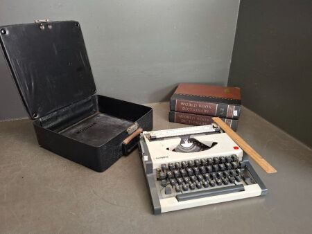 Vintage Portable Manual Olympia Typewriter in Case