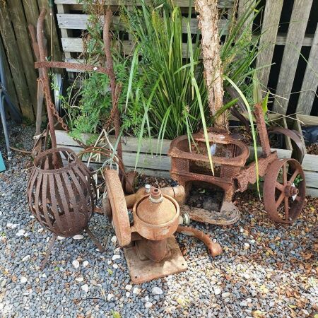 Collection of Rusty Iron Garden Bits inc. Wheel, Old Trolley, Stove, Candle Sconces, Cream Seperator etc.