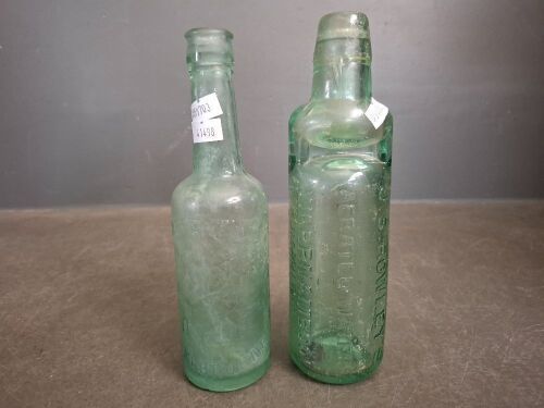 2 Collectable Bottles - 1 J.S.Rowleys Warrnambool & Hamilton Bottle + 1 Property of O.T Ltd Melbourne Bottle