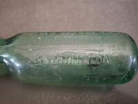 2 Collectable Bottles - 1 J.S.Rowleys Warrnambool & Hamilton Bottle + 1 Property of O.T Ltd Melbourne Bottle - 3
