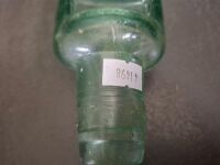 2 Collectable Bottles - 1 J.S.Rowleys Warrnambool & Hamilton Bottle + 1 Property of O.T Ltd Melbourne Bottle - 4