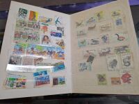 3 World Stamp Albums - 4