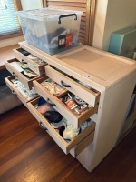 Wooden storage cabinet with millinery contents - 2