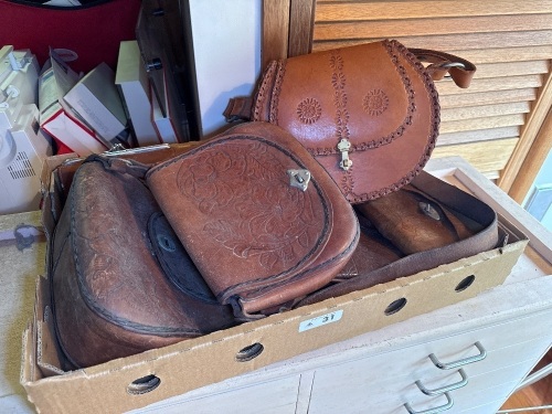 Box lot of leather handbags and purses