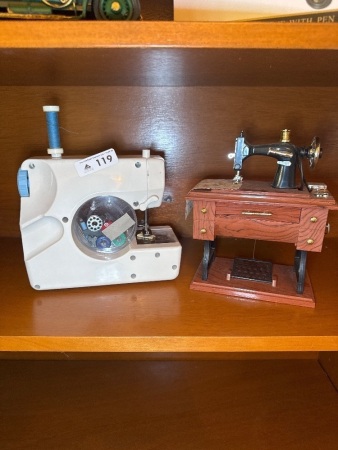 Two miniature sewing machines