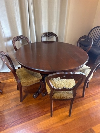 Antique Dining Table with 6 Hand Carved Dining Chairs