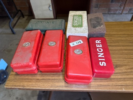 Assorted Singer sewing machine accessories