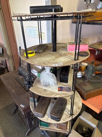 Stand with Assorted sewing machine parts/accessories