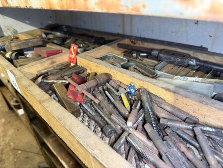 Shelf lot of taps and dies