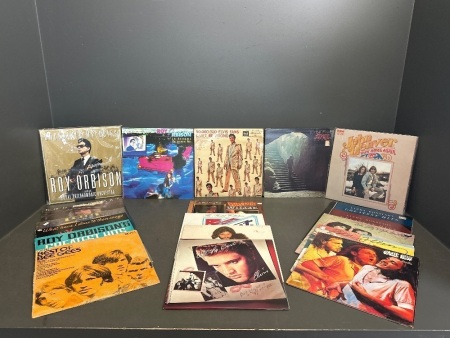 Assortment of Mixed Genre Vinyl Records